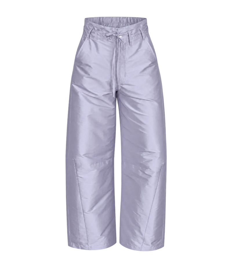 Flay lay front view of the Chan Luu Techno Taffeta Barrel Pant in Lilac, showing the tied front waist, button closure and curved barrel legs