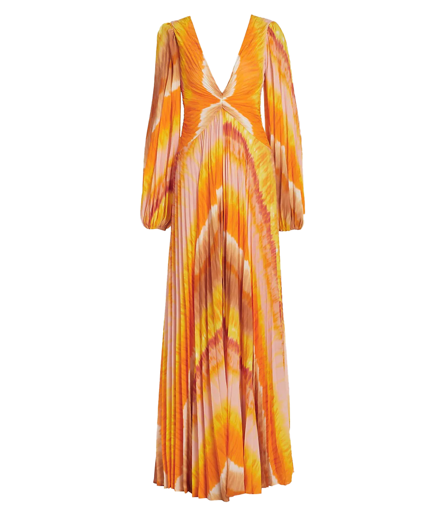 Image of a maxi length long sleeve glamourous gown in a warm sunset print of orange, pink & yellow. Featuring all over pleats, plunge neckline, balloon sleeves, split hem line, twisted waistline. Evening gown, wedding guest, long lunch, formal, made in miami. 