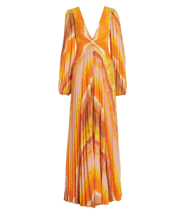 Image of a maxi length long sleeve glamourous gown in a warm sunset print of orange, pink & yellow. Featuring all over pleats, plunge neckline, balloon sleeves, split hem line, twisted waistline. Evening gown, wedding guest, long lunch, formal, made in miami. 