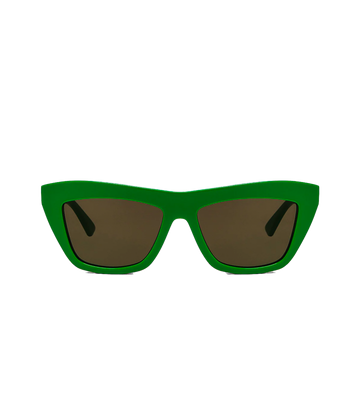 Image of a green acetate cat eye sunglass, with frame detailed with gold-tone hardware, an embossed logo on the arm and feature a brown lense.    