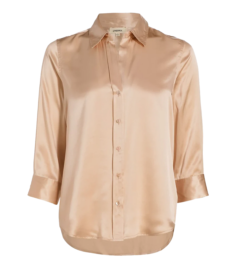 Image of a classic button-down blouse in champagne, with curved hem, three-quarter-length sleeves, silk, button down detail. Bra friendly, work ware, everyday, throw on and go, made in USA. 