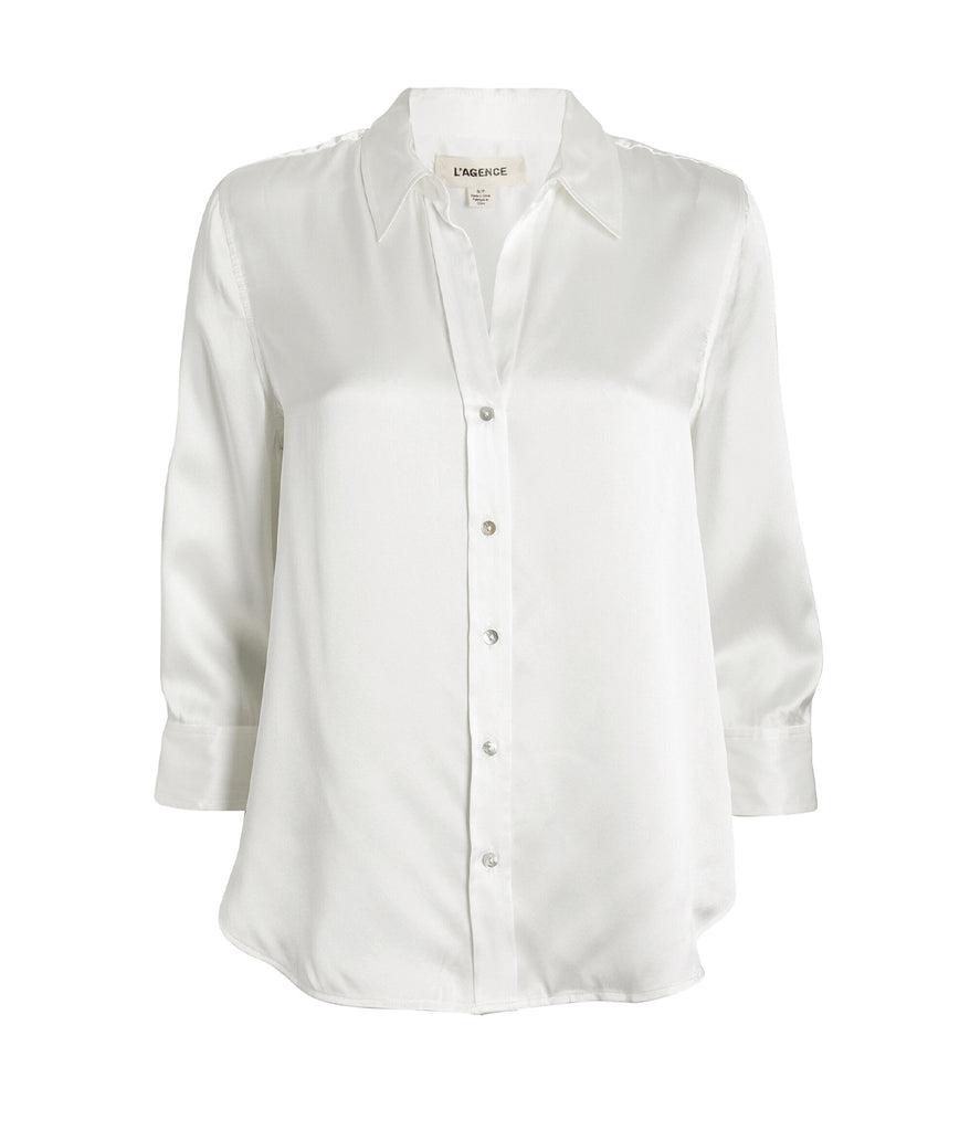 Image of a classic button-down blouse in ivory, with curved hem, three-quarter-length sleeves, silk, button down detail. Bra friendly, work ware, everyday, throw on and go, made in USA. 
