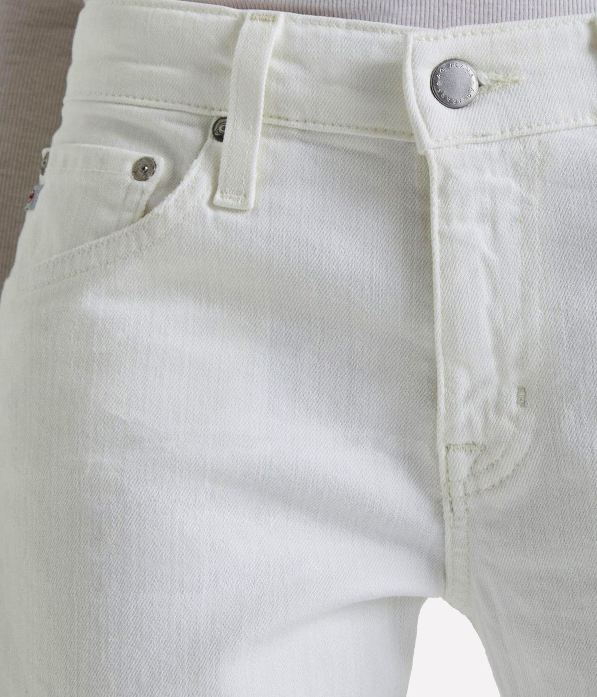 Ex-Boyfriend Slim Jean in 1 Year Tonal White, featuring a relaxed slim fit, mid-rise waist, and clean white denim with subtle tonal detailing for a modern, versatile look.