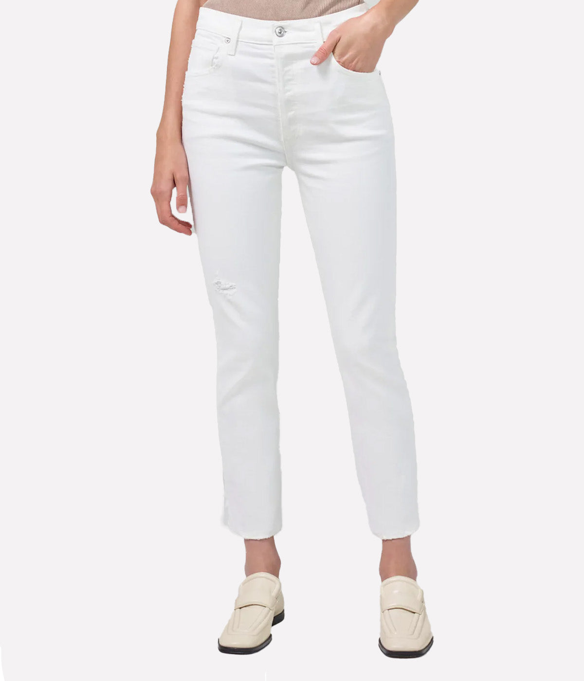 ALT Text: Citizens of Humanity Jolene Jean in clean white denim with subtle distressing, high-rise fit, and slim-leg silhouette. Perfect for versatile styling.
