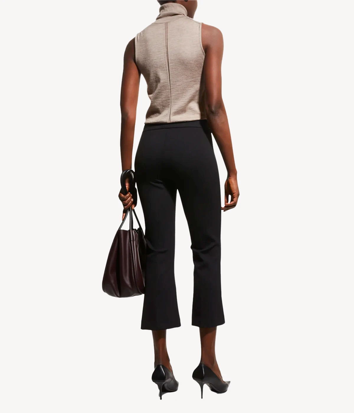  Its flat front provides a sleek look from waist to thigh, while the fitted hip and flared knee allows for ultimate freedom of movement.