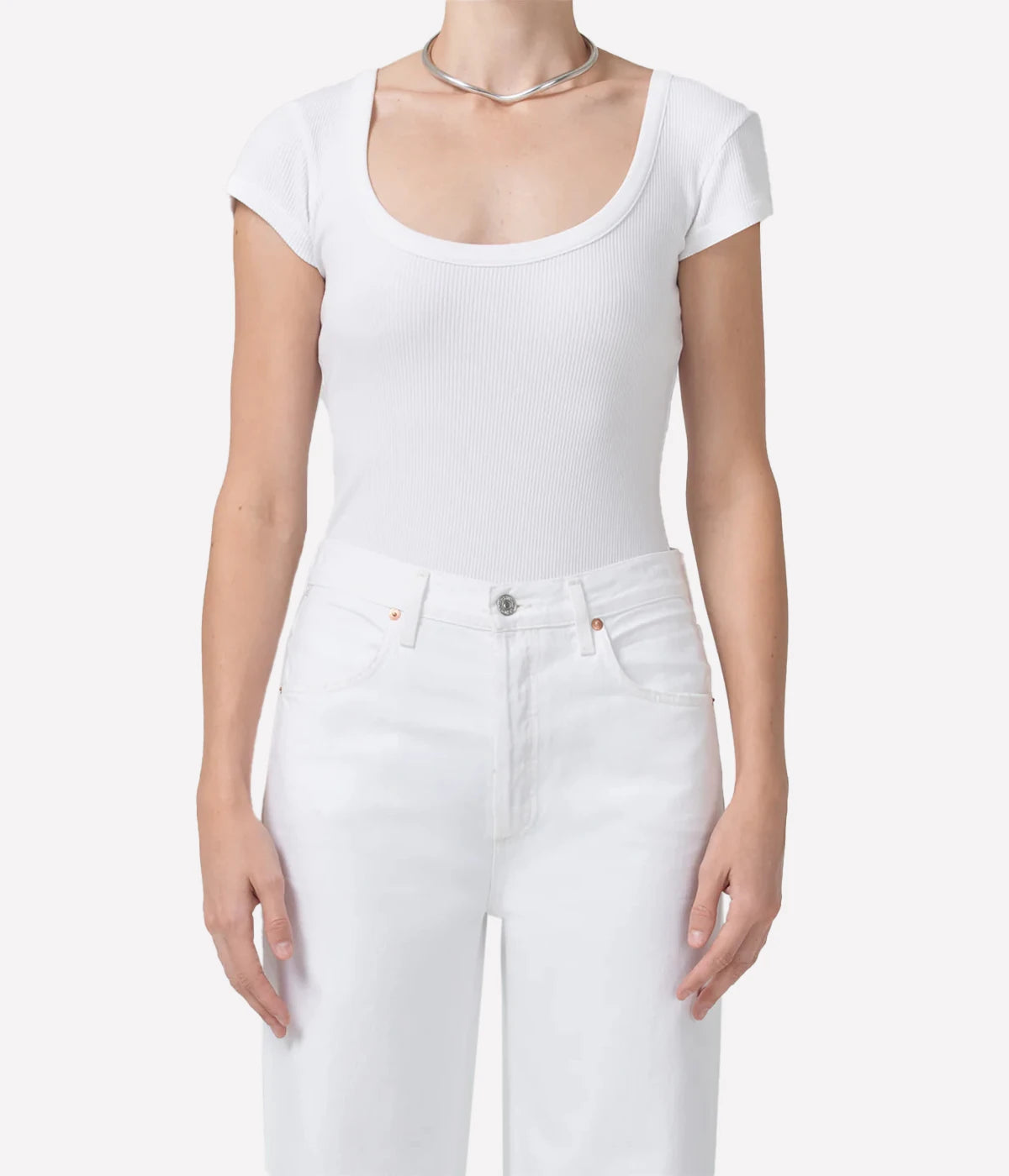 Image of a cap sleeve fitted t-shirt, featuring a scoop neck and a delicate short sleeve. 