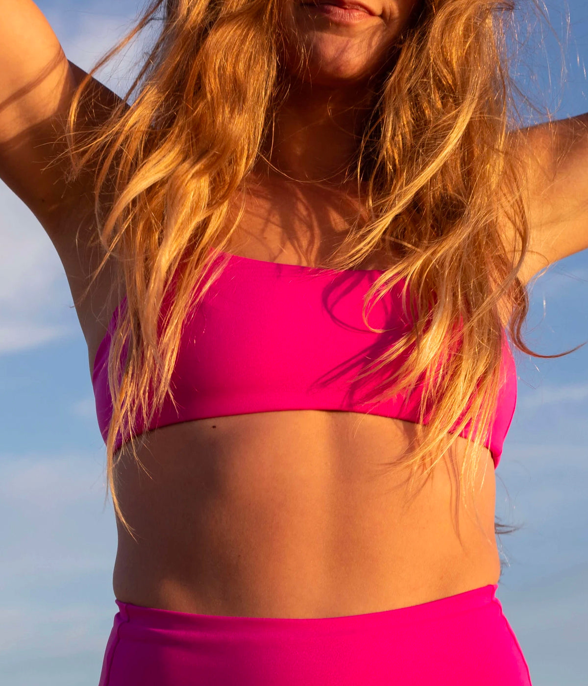 Go from the water to the poolside or beach in the Pool Days Top in Hot Pink. A medium coverage bright pink bikini top with a scoop neckline, Double lined for a flattering fit. 