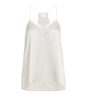 Image of a spaghetti strap off white silk camisole, with lace neckline detailing, low back neckline with a lace cross-over. Made internationally, trendy, sophisticated, fashion forward, date night top, sexy top. 