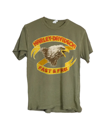 Image of a olive green vintage inspired distressed T-shirt. Featuring a large eagle Harley Davidson inspired graphic, short sleeve and baggy fit.