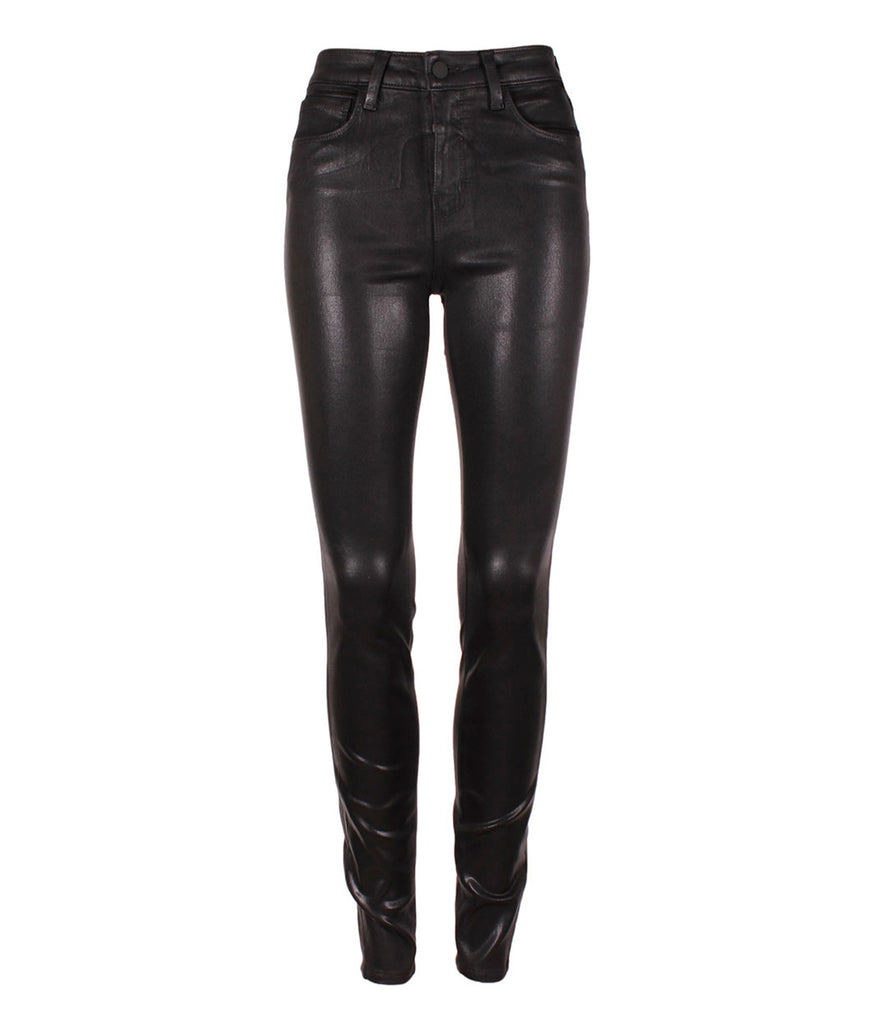  Image of a classic black coated denim skinny jean, with a tapered leg, leather pants, silver hardware, skinny fit. Everyday jean, coated denim, made in USA, crop jean, date night outfit. 